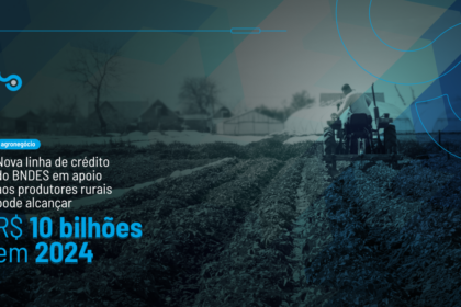 Operador agrícola usando tecnologia no campo para acessar nova linha de crédito agro.