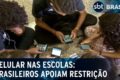 Celular com alerta de segurança representando 81% dos brasileiros alvos de golpes digitais