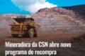 Complexo de mineração CSN Mineração com pilhas de minério de ferro e estrutura logística