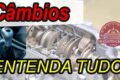 Câmbio automático desmontado em oficina com peças danificadas destacando riscos de transmissões problemáticas