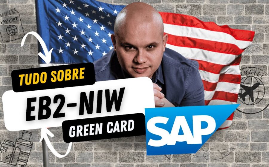 Profissional analisa documento de Green Card com gráficos de carreira ao fundo