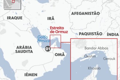 Navio de guerra bloqueia Estreito de Hormuz com petroleiros parados, simbolizando crise do petróleo e tensão Trump-Irã