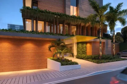 Equipe da Vectra recebe clientes em apartamento decorado moderno, demonstrando experiência de compra humanizada