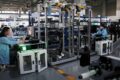 Executivos ocidentais e chineses apertam as mãos sobre tecnologia de veículos elétricos e IA
