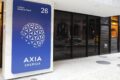 Logotipo da Axia Energia com gráficos de ações e valores R$ 4 bi para recompra de PNCs