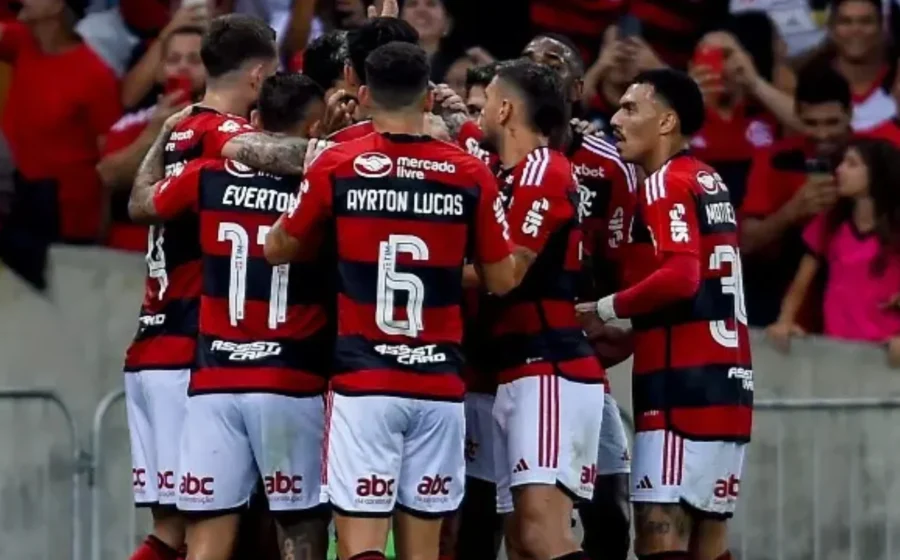 Técnico Dorival Júnior e escudo do Flamengo com símbolos de apostas esportivas e justiça
