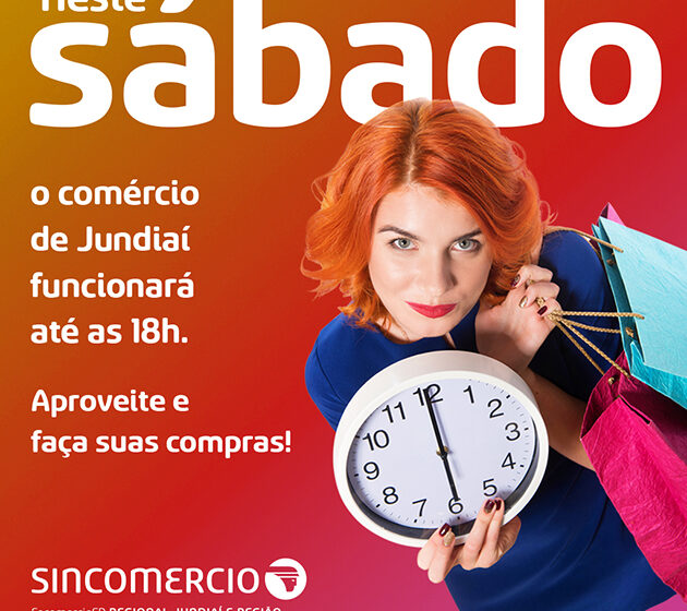 Vitrine de loja em Divinópolis com placa de horário estendido até 18h no sábado véspera do Dia das Crianças