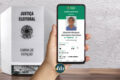 Smartphone exibindo o aplicativo e-Título com foto validada para votação 2026