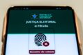 Tela do app e-Título com botão de download ativo no dia da eleição 2026, TSE libera acesso para 150 milhões
