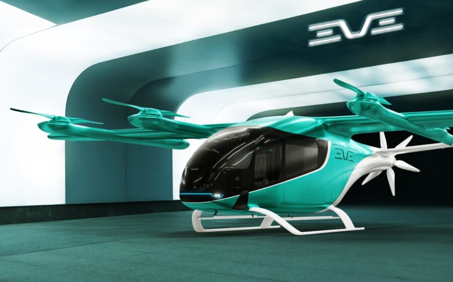 eVTOL elétrico decolando verticalmente em ambiente urbano, representando futuro da mobilidade aérea