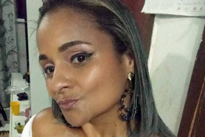 Fachada da Clínica Celita Toledo em Laranjeiras com fita de isolamento policial e viaturas na frente