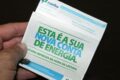 Bandeira tarifária verde sobre conta de luz residencial indicando isenção de taxa extra em novembro