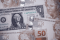 Gráfico mostra dólar a R$ 5,05 com indicadores de inflação 2027 e empate técnico eleitoral