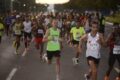 Corredores largando na Corrida Abrace 40 Anos no Eixo Rodoviário Sul de Brasília