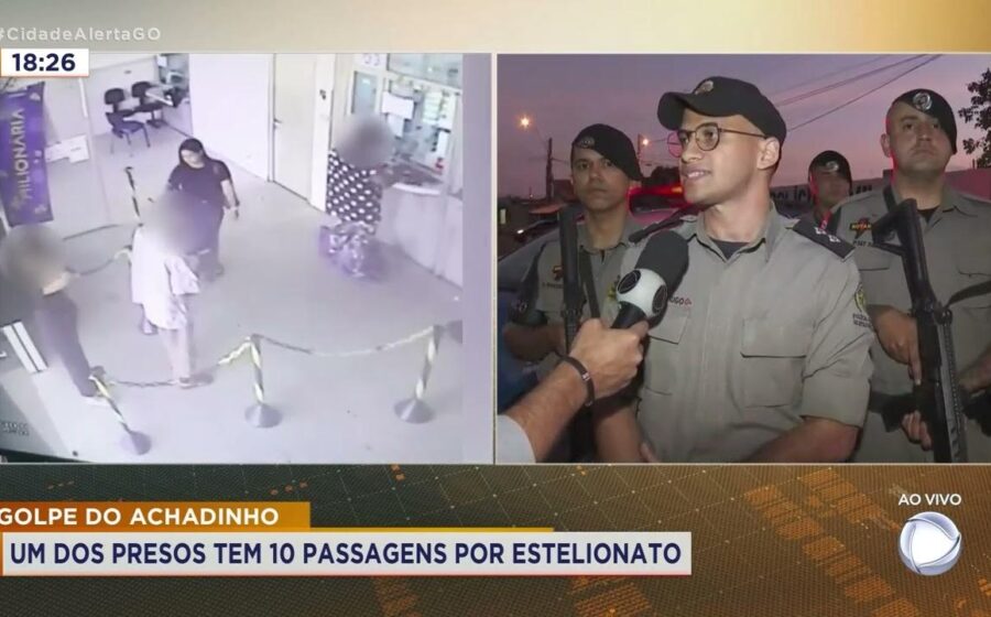 Casal algemado sendo conduzido por policiais após tentativa de suborno de R$ 5 mil em Macaíba