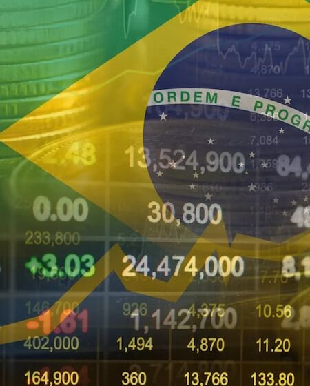 Gráfico do Ibovespa Futuro em queda com indicadores vermelhos e logos da Vale e bandeira do Brasil