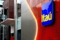 Logotipo do Itaú Unibanco e Equatorial Energia sobre fundo de gráfico financeiro em alta