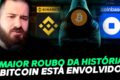 Logotipo da Binance com símbolo de alerta vermelho e cadeado quebrado representando o maior roubo cripto de US$ 6,3 bi