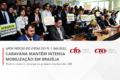 Eleitores brasileiros em fila para votar no segundo turno de 2022, com bandeira do Brasil ao fundo