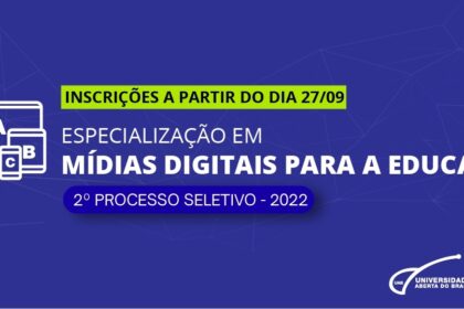 Estudantes em laboratório de informática da UFMT com telas exibindo código de IA e ciência de dados