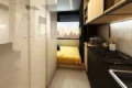Prédio moderno com microapartamentos em São Paulo, investimento imobiliário alta ocupação
