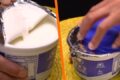 Pote de requeijão cremoso com rótulo visível mostrando informações nutricionais e lista de ingredientes
