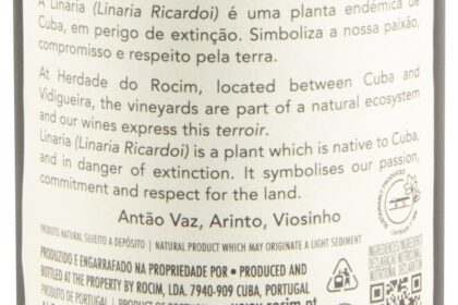 Garrafas de vinho Herdade do Rocim sobre mesa de degustação em São Paulo