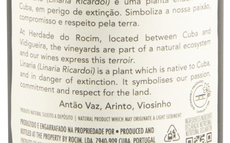 Garrafas de vinho Herdade do Rocim sobre mesa de degustação em São Paulo
