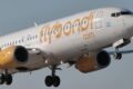Aeronave Flybondi estacionada em aeroporto brasileiro com portas fechadas simbolizando saída do mercado