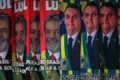 Secretário maranhense em coletiva ao lado de viaturas da PM, com ícone de WhatsApp e balão "brincadeira" sobreposto