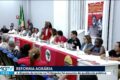 Logotipo da TV Integração e g1 Triângulo Mineiro com ícone de transmissão ao vivo em tela de smartphone