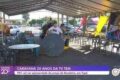 Ônibus da caravana gratuita de Tupã na FE26 com empresários e estande de produtos de amendoim