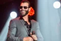 Gusttavo Lima em destaque com logotipo Vai de Bet e documentos da Operação Sem Compliance ao fundo