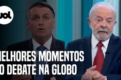 Palco do debate presidencial no 2º turno nos Estúdios Globo com púlpitos e cenografia iluminada